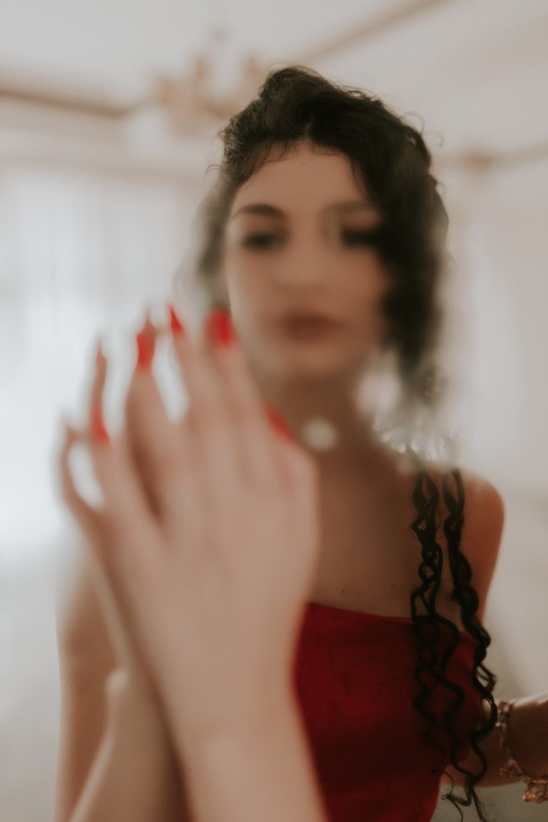 woman in blurry mirror