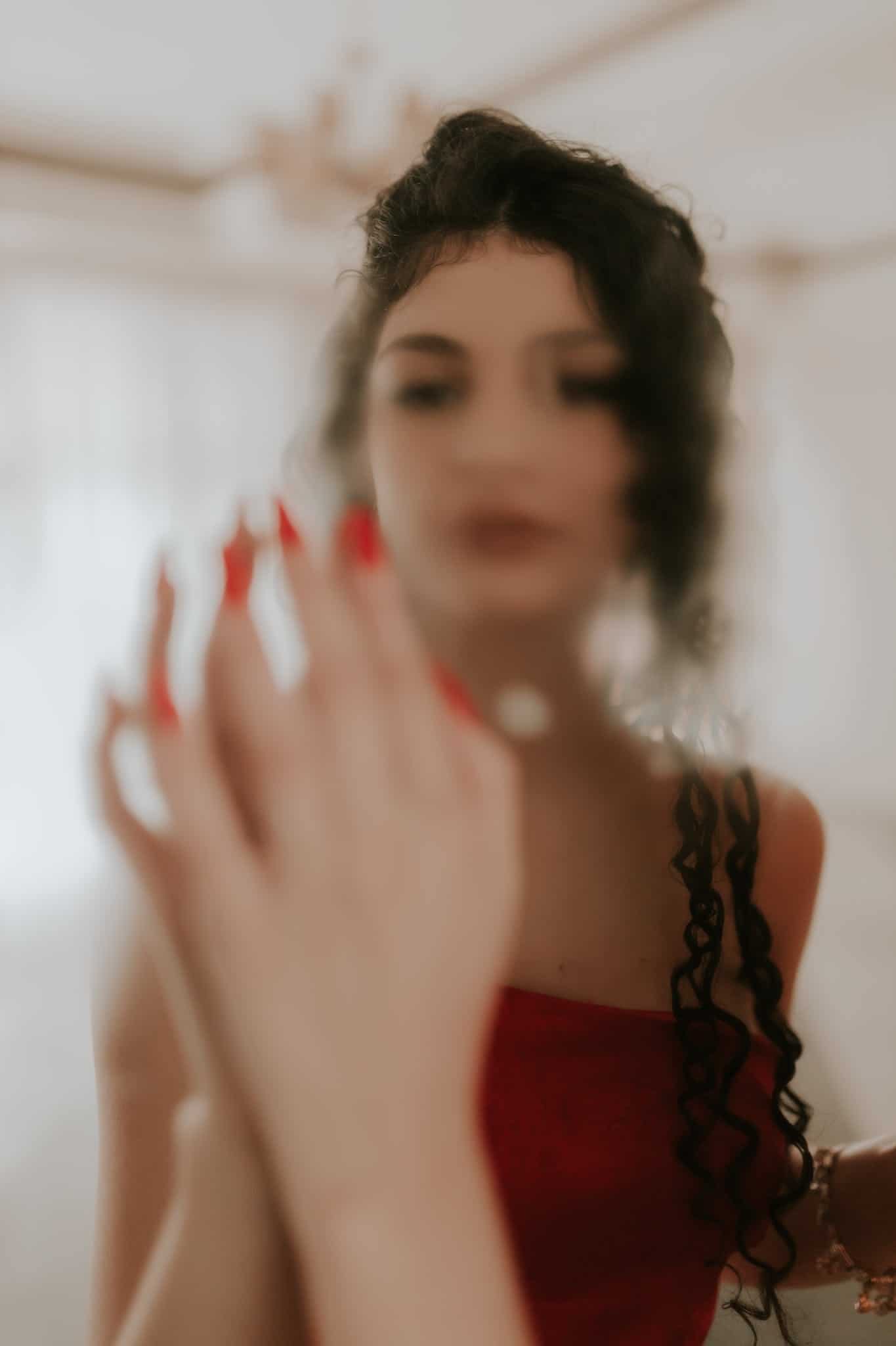 woman in blurry mirror